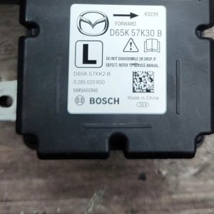 D65K57K30B HỘP ĐIỀU KHIỂN TÚI KHÍ MAZDA 2