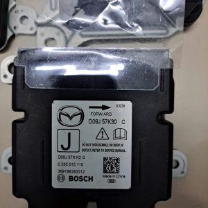 D09J57K30C HỘP ĐIỀU KHIỂN TÚI KHÍ MAZDA 2